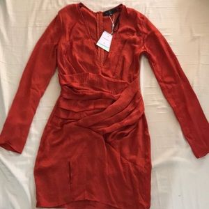 misguided orange silky long sleeve labeled dress